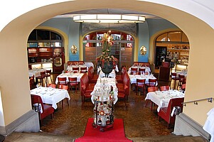 Restaurant Refugium mit Tischen und Sitzen - Innenansicht